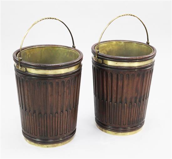 A pair of large mahogany brass bound peat buckets, H.2ft 5in. incl. handle